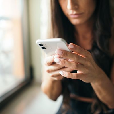 Player holding a smartphone