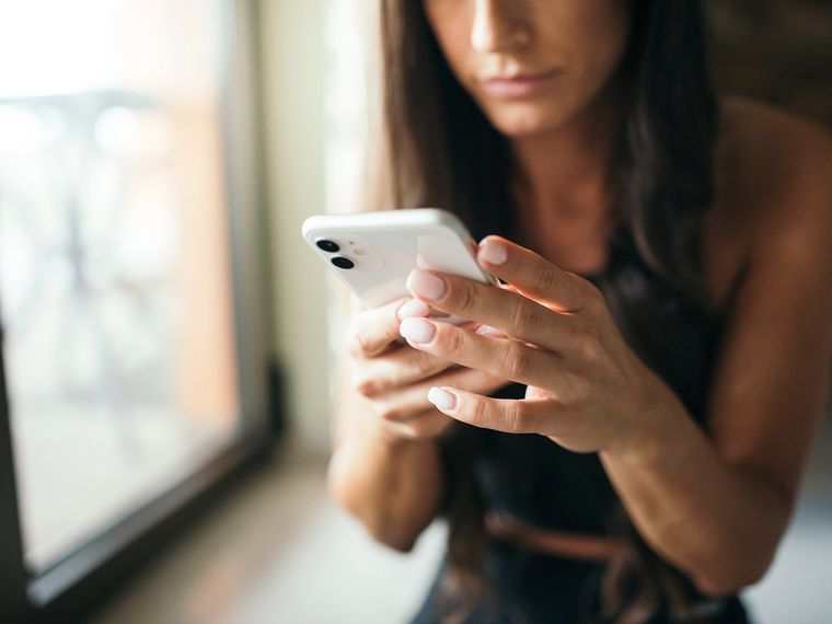 Hands holding a smartphone
