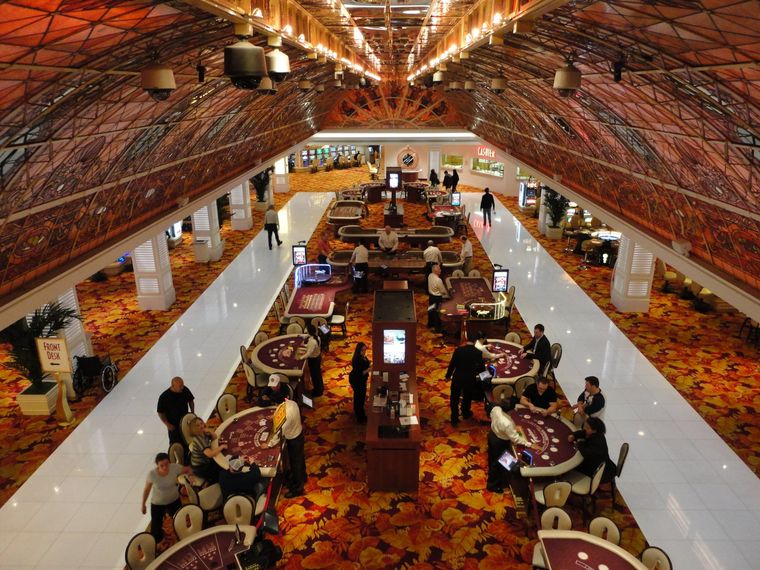 Casino gaming floor with table games seen from above